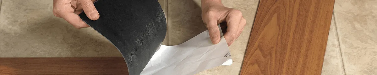 A professional installing vinyl flooring in Orlando, FL